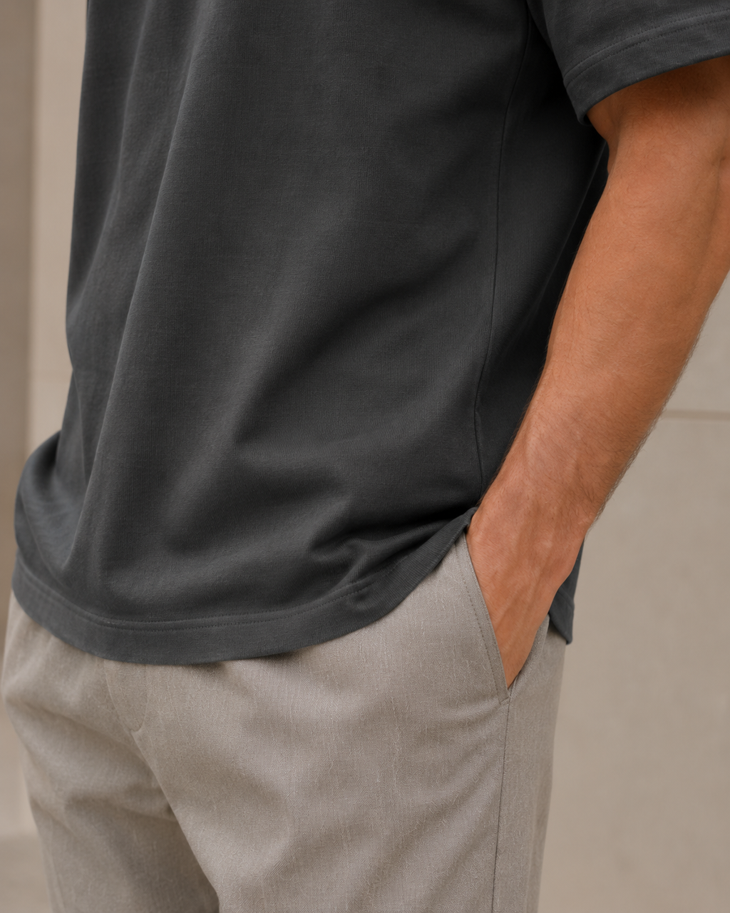 Close-up of the fabric drape and hem of the NORVEN Origin Heavyweight Tee in Charcoal